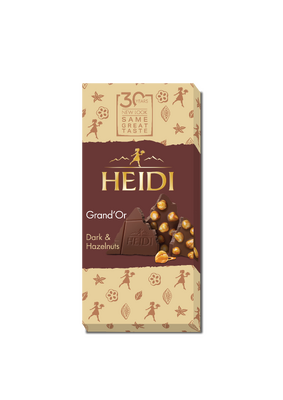 CIOCOLATA HEIDI LAPTE CU MIGDALE INTREGI 100G